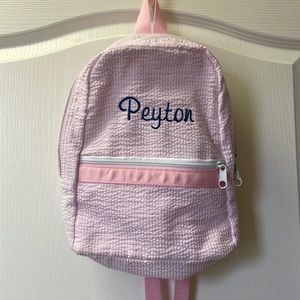 Children’s seersucker backpack by Mint. Personalized with the name Peyton.